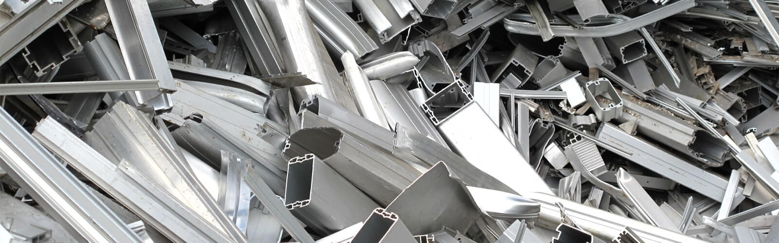 Crushed aluminum beverage cans and scrap metal