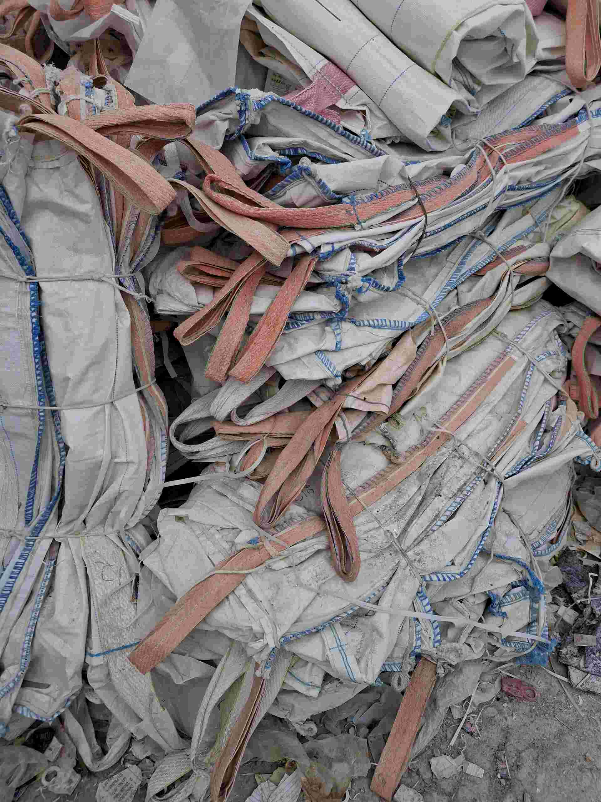 Stack of used jute gunny bags for upcycling and recycling